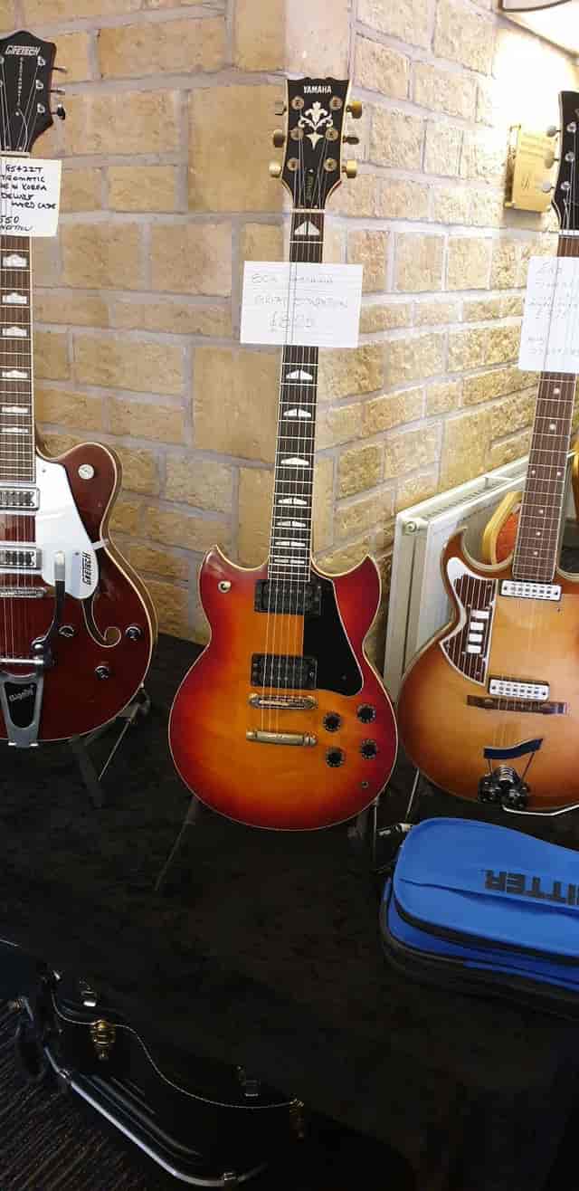 Guitars in The Ashcroft's Main Hall for a music-themed event or conference.