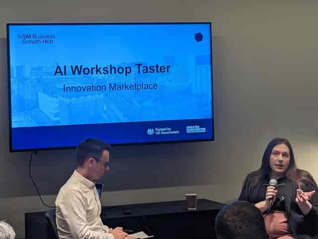 AI workshop setting in Serendipity Labs Manchester with engaging speaker and intimate layout.
