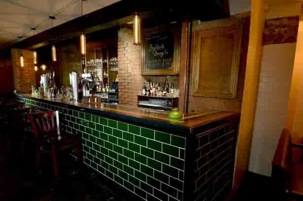 Arcane Cocktail Bar Manchester with rustic charm, ideal for networking events and gatherings.