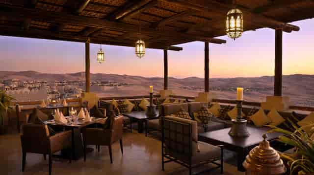 Elegant rooftop venue at Essence Restaurant, perfect for exclusive events with sunset views.