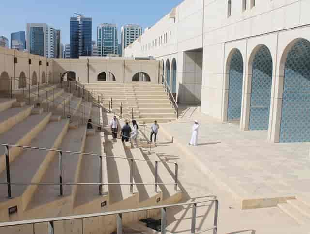 Modern outdoor amphitheater in Exhibition Hall for presentations and networking events.