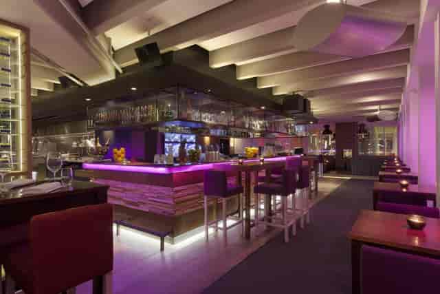 Modern cocktail bar at Floor17 with purple accents, perfect for private events and receptions.