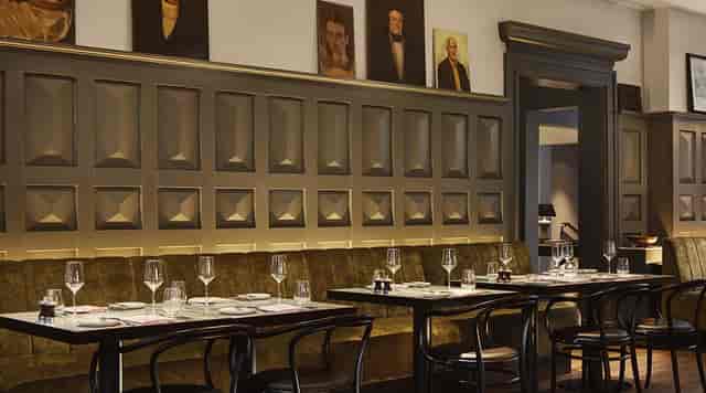 Elegant semi-private dining room at Jansz, ideal for intimate networking events.