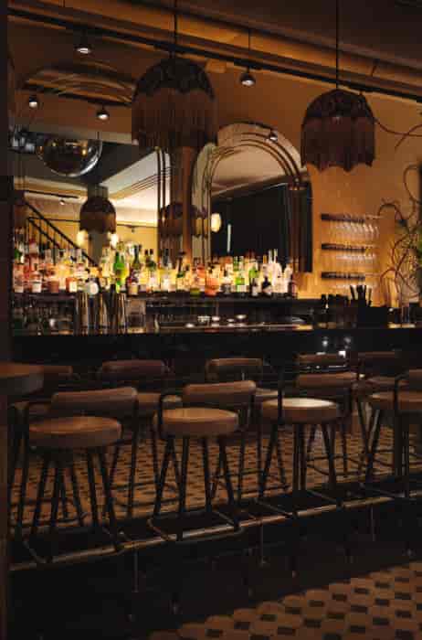 Sophisticated Mata Hari bistro bar with elegant decor, ideal for networking events.