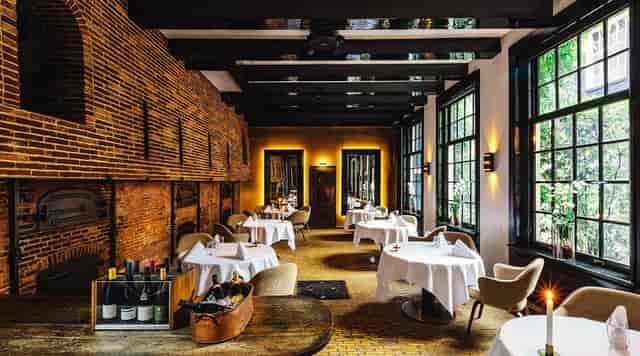 Private dining room in Senses Restaurant Amsterdam, elegant decor for gourmet events.