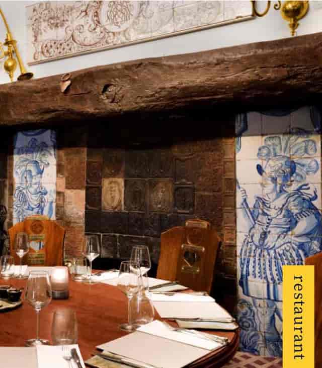 Binnenhof Room in Restaurant d'Vijff Vlieghen, rustic decor for upscale events and dinners.