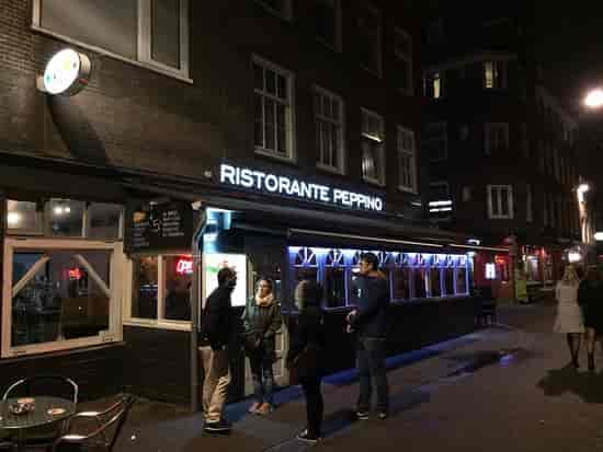 Charming Restaurant Peppino façade in Amsterdam, ideal for gatherings and networking events.