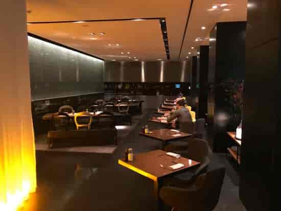 Contemporary dining space at Art Hotel Amsterdam for corporate dinners and networking events.