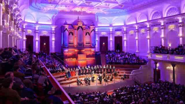 Recital Hall at The Royal Concertgebouw, elegant architecture, concert event ambiance.