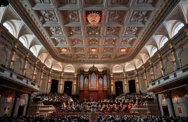 Royal Concertgebouw Choir Hall with ornate ceiling, ideal for concerts and events.