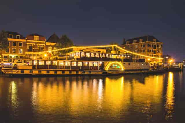 Illuminated boat dock at Panoramic salon, perfect venue for evening events and gatherings.