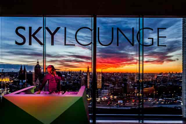 Sky Room rooftop venue in Amsterdam with sunset views, perfect for events and networking.