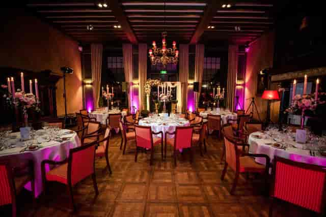 Elegant banquet hall at Kasteel de Wittenburg for weddings and corporate dinners.