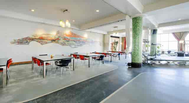 Versatile event space in Kompaszaal with modern decor for meetings and social gatherings.