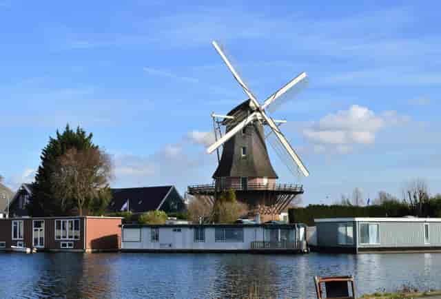 Traditional windmill at Molen van Sloten, perfect for outdoor events and networking.