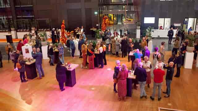 Small Auditorium in VU Griffioen, vibrant decor, networking event atmosphere