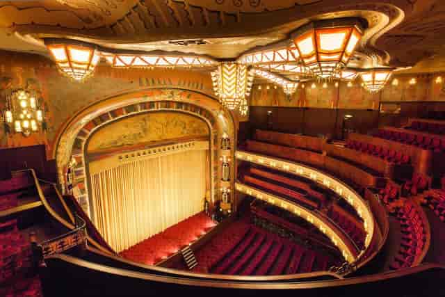 Ornate theater interior at Koninklijk Theater Tuschinski for performances and events.