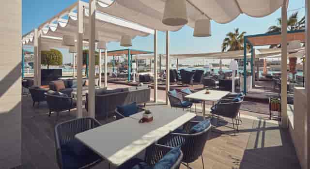 Outdoor event venue at Kamoon Terrace with stylish awnings, perfect for meetings.