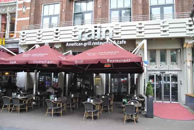 Vibrant outdoor dining at Rain restaurant, perfect for events and casual gatherings.