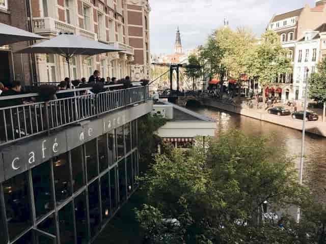 Balcony at Café de Jaren, ideal for networking events by the canal.