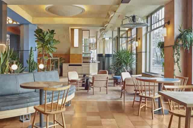 Modern event space at Small Bar, Karavaan Amsterdam, perfect for networking and meetings.