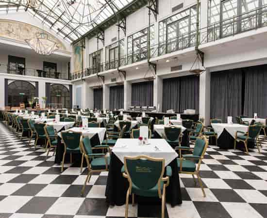 Elegant Wintergarden venue at Anantara Grand Hotel for conferences and formal events.