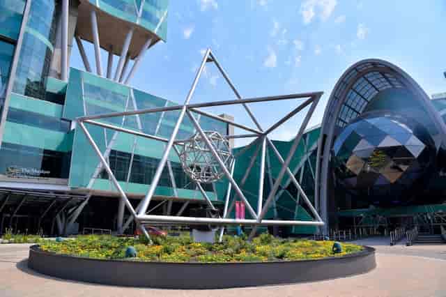 Jade at The Maslow Time Square, showcasing a geometric sculpture in a modern conference venue.