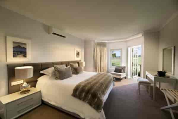 Breakaway Rooms at Fancourt: serene guest room with natural light for events and retreats.