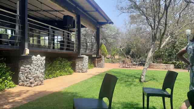 Outdoor venue at Riverside with green space, ideal for meetings and events.