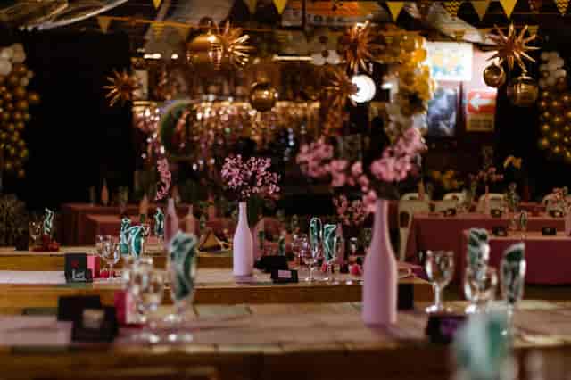 Ye Olde Farm House event space with floral decor, ideal for gatherings and celebrations.