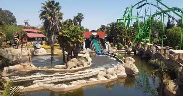 Vibrant Gold Reef City amusement park with water attractions, great for team-building events.