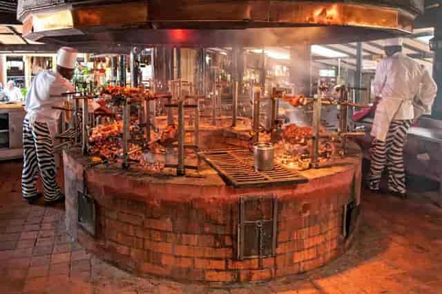 Vibrant outdoor grill station at The Carnivore, ideal for catering events and gatherings.
