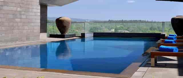 Elegant rooftop restaurant with pool at Sankara Hotel Nairobi, ideal for events and networking.