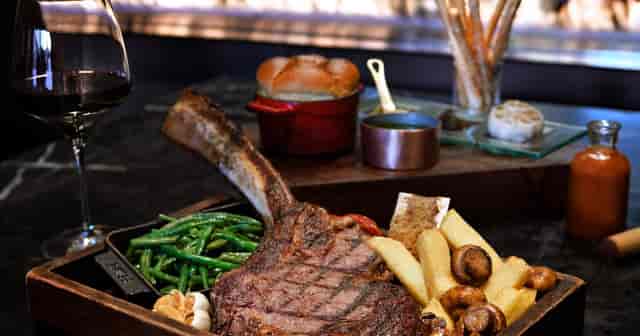 Rooftop dining at Sankara Hotel Nairobi featuring gourmet meal for upscale events.