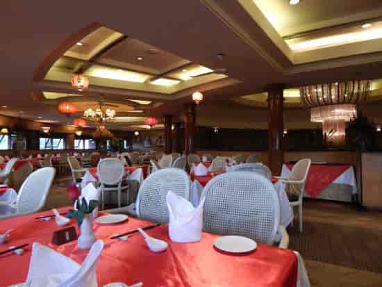 Pavilion Conference Centre dining area with elegant decor for events and banquets.