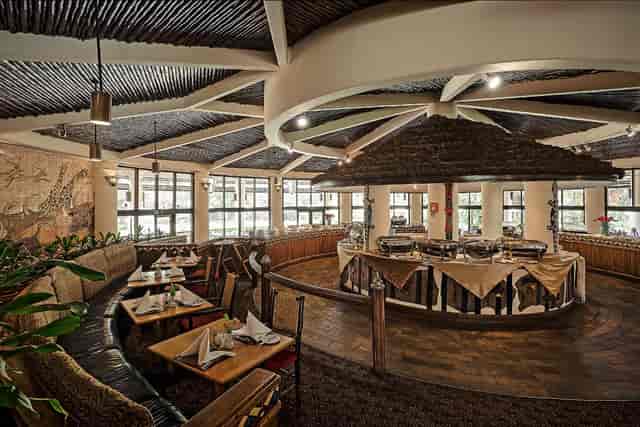 Pavilion Conference Centre, warm decor, ideal for meetings and events.