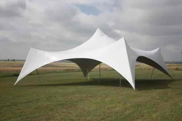 Aluhall Tent in Expat Events: sleek fabric structure perfect for outdoor weddings and festivals.