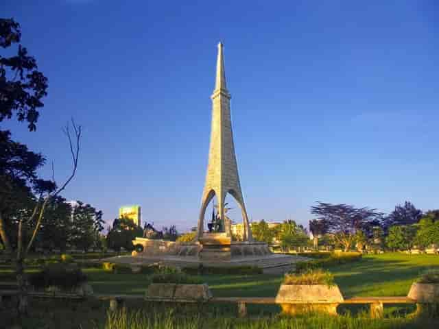 Main Entrance at Uhuru Gardens with iconic spire, ideal for outdoor events and gatherings.