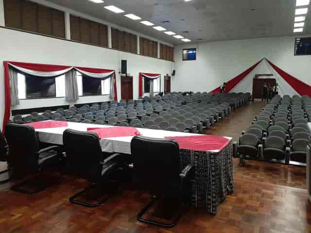 Spacious conference hall with organized seating for formal meetings at KSMS Conference Centre.