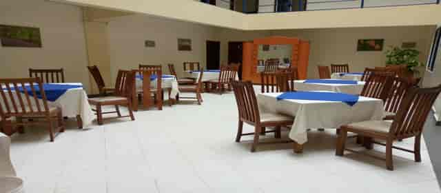 Spacious Starehe Restaurant venue with blue accents for events and networking in Meru.