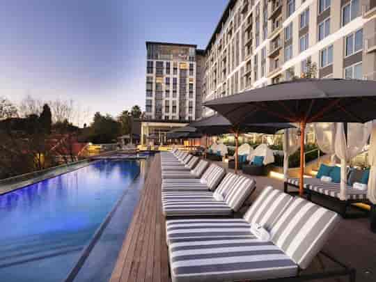 Luxurious poolside setting at The Pod, ideal for outdoor events and gatherings.