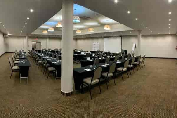 Spacious U-shaped conference room at The Capital Conference Venues for meetings and presentations.