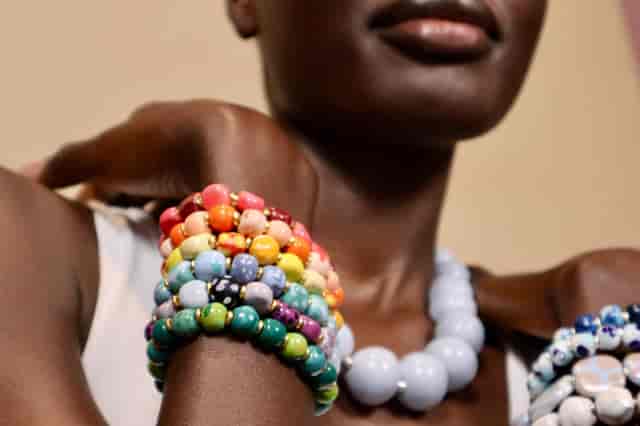 Vibrant handcrafted bracelets at Kazuri Bead Bar for unique event styling.