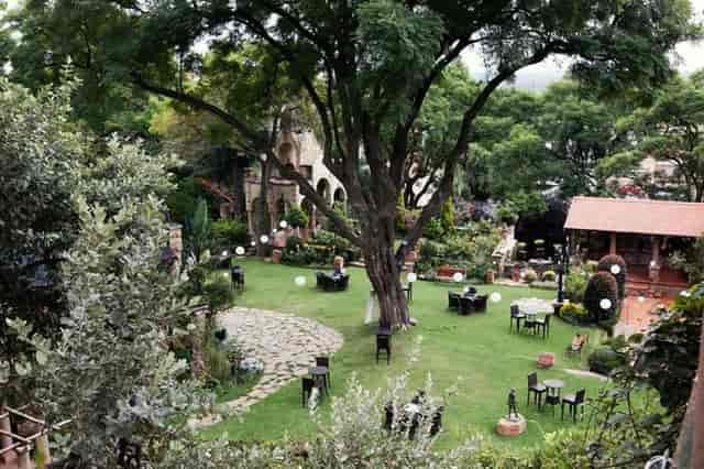 Lush outdoor garden venue at The Forum, perfect for weddings or corporate events.