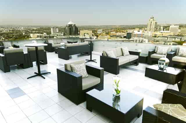 Sleek rooftop venue with panoramic city views for upscale events and cocktail receptions.
