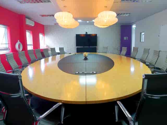 Dar Es Salaam Boardroom with large oval table, ideal for meetings and events.
