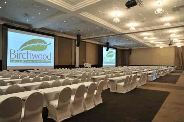 Auditorium at FNB Conference Centre set up for a corporate meeting with elegant seating.