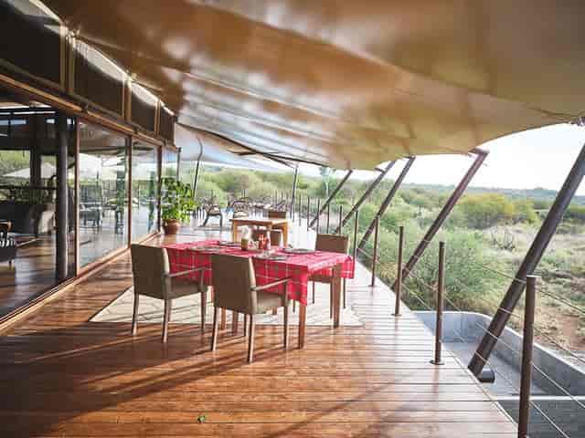 Outdoor dining area at Atua Enkop Africa, perfect for retreats and events.