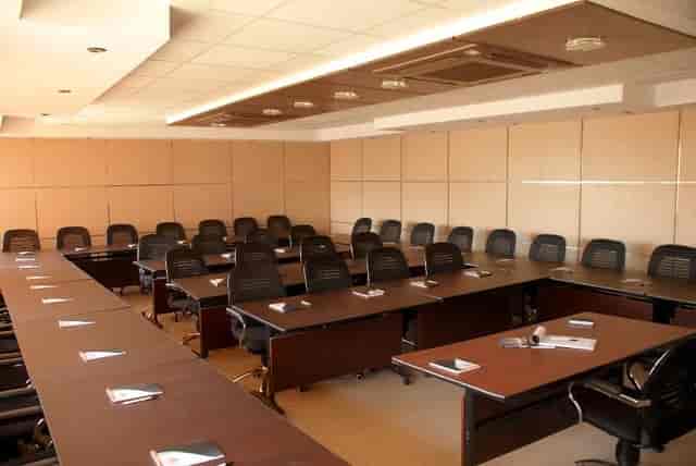 Conference Room in College of Insurance, organized with ergonomic chairs for corporate meetings.