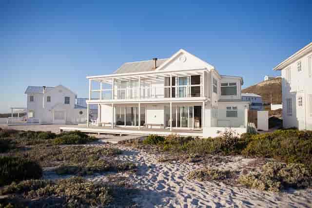 Beachfront event space with modern design, perfect for retreats and executive meetings.